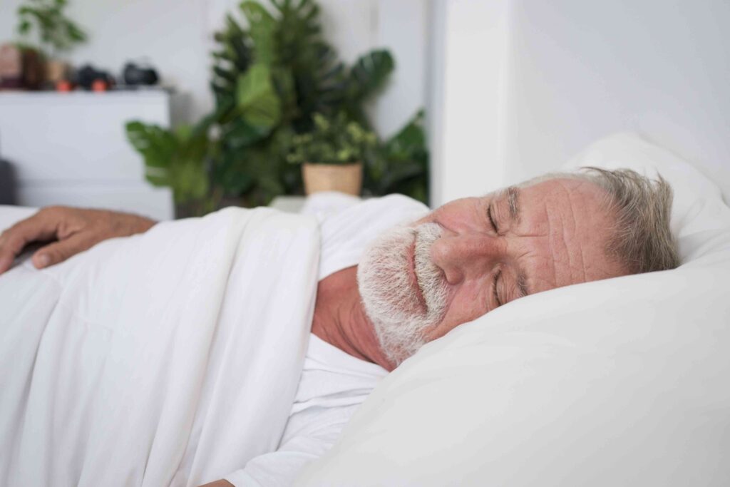 Man sleeping in bed